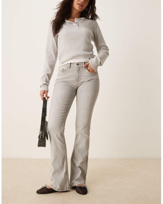 Gina Tricot Low Rise Bootcut Flare Stretch Jeans in Natural Lyst