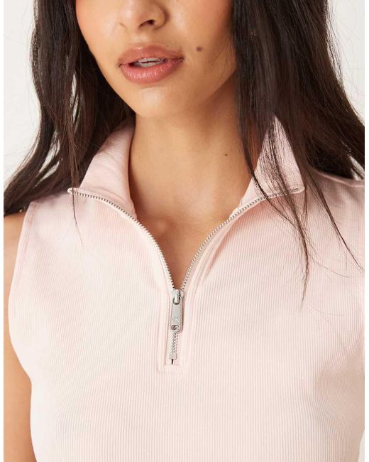 Calvin Klein White Sleeveless 1/4 Zip Logo Polo Top