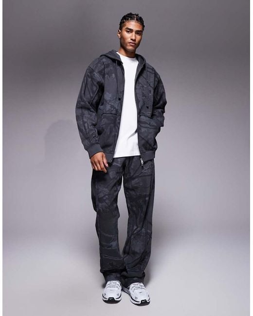 Liquor N Poker Blue Oversized Camo Print Zip Hoodie for men