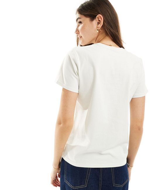 Camiseta blanco con logo y texto "cowboys 47" estampados Wrangler de color Blue