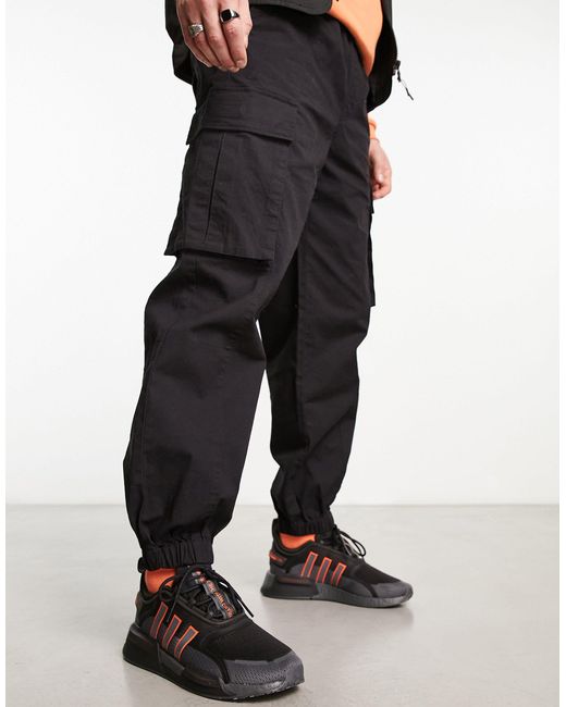Adidas nere hotsell e arancioni