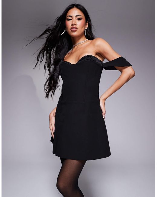 Robe corset courte à buste froncé avec laçage dans le dos et encolure bardot Murci en coloris Black
