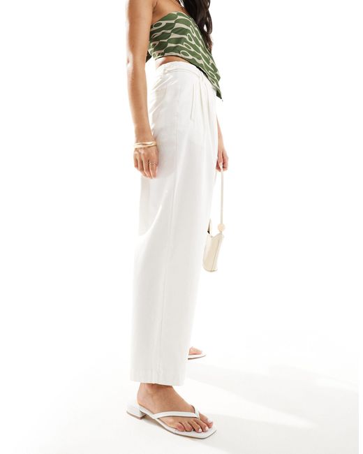Pantalon chino ample avec patte ASOS en coloris White