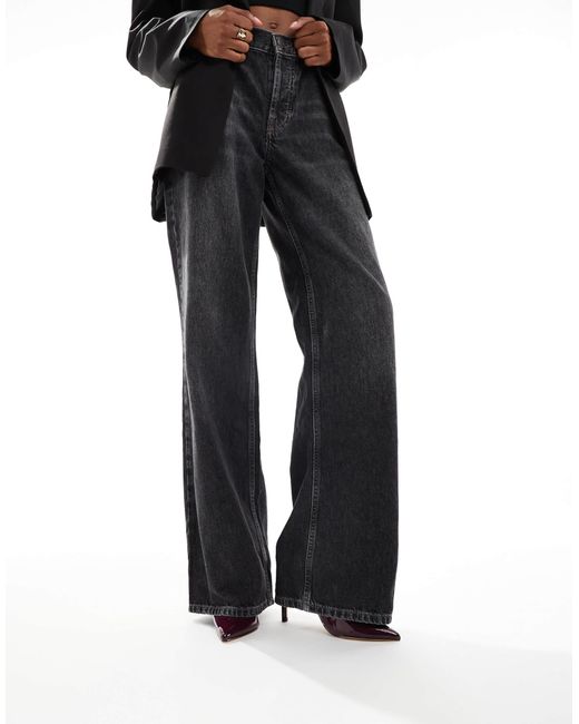 SEQWL Black Petunia High Vamp Pumps