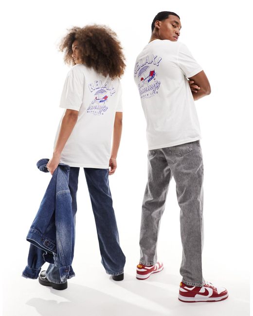 T-shirt unisex vestibilità classica bianca con grafica di Tommy Hilfiger in Blue