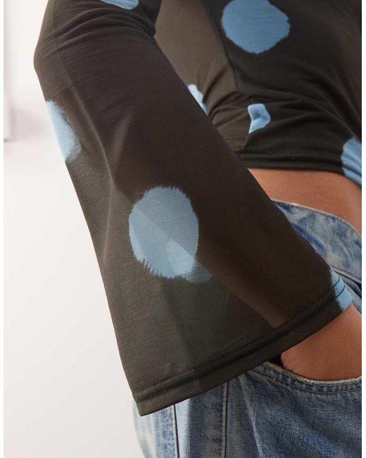 Reclaimed Vintage Blue Slash Neck Flare Sleeve Top With Spliced Blurred Polka Dot Print