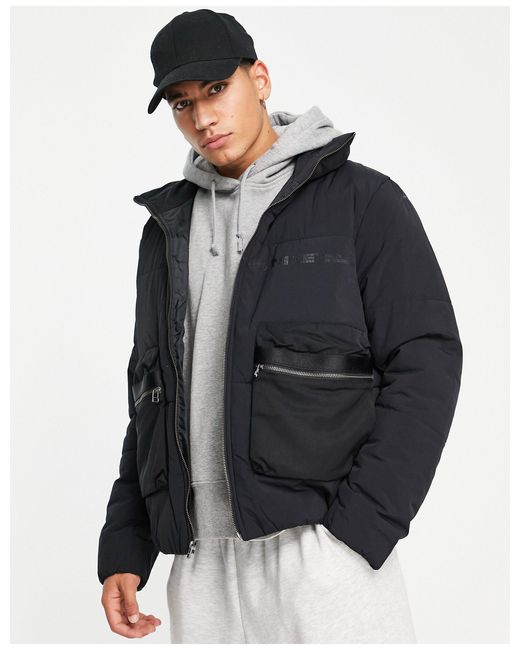 City made - veste matelassée utilitaire Nike pour homme en coloris Noir |  Lyst