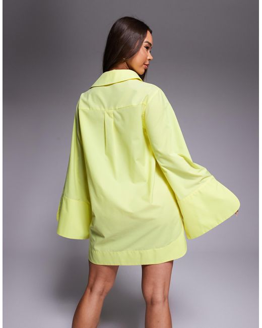 Robe chemise courte à rayures avec revers larges et poches oversize - jaune vif ASOS en coloris Yellow