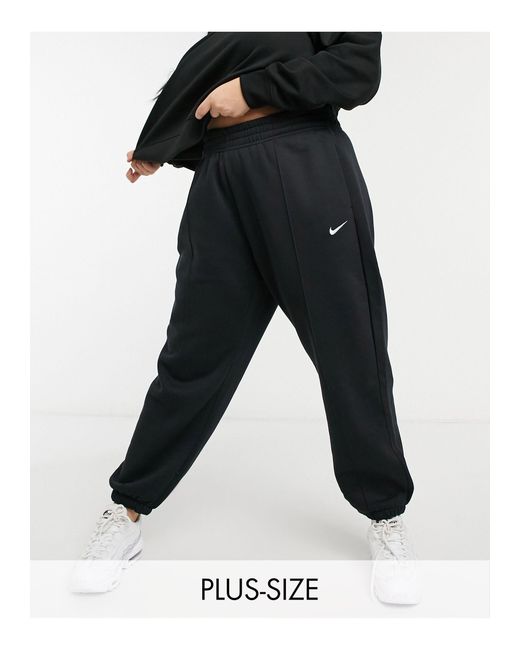 Plus - joggers oversize neri con logo piccolo di Nike in Nero | Lyst