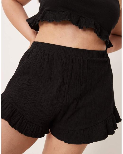 Pantalones Cortos Negros Con Vuelo De Tejido Efecto Rugoso De Asos Design Curve (Parte De Un Conjunto) ASOS de color Black