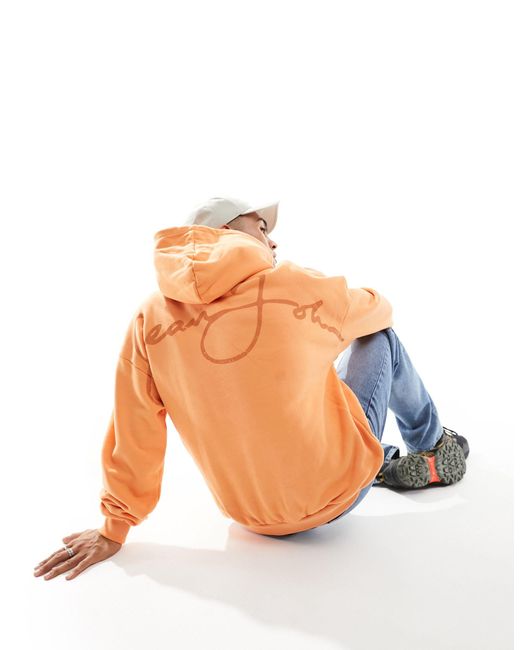 Felpa con cappuccio con scritta stampata sul petto di Sean John in Orange da Uomo