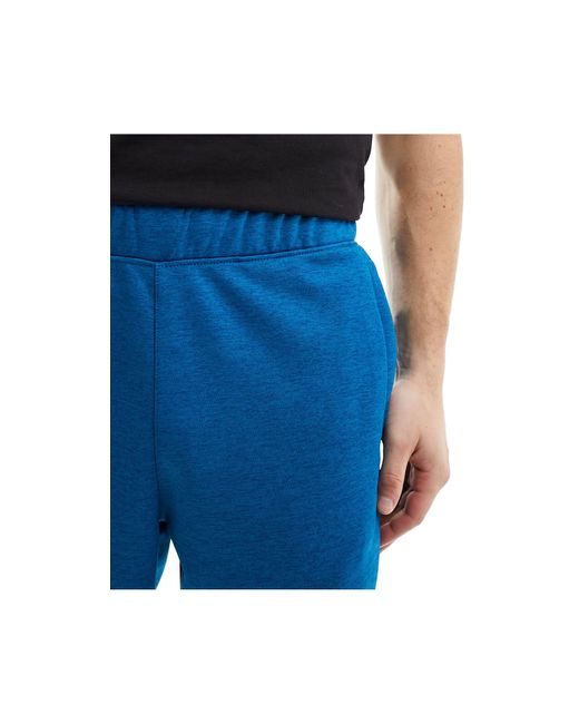 The North Face Blue Training Reaxion Logo joggers for men