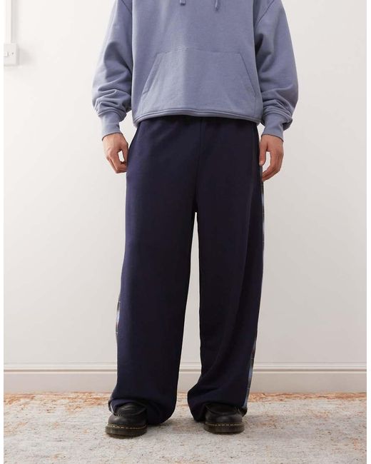 Reclaimed (vintage) Joggingbroek Met Wijde Pijpen En Geruite Streep Aan De Zijkant in het Blue voor heren