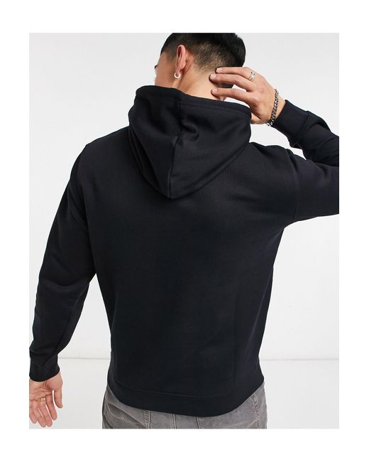 Sudadera negra con capucha y logo Champion de hombre de color Negro | Lyst