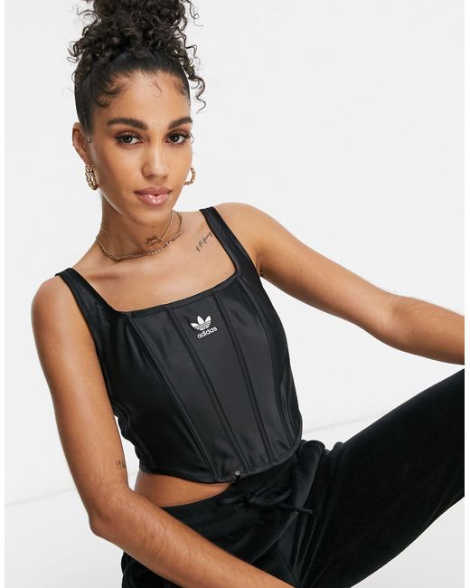 Relaxed risqué - corset effet satin Adidas Originals en coloris Black