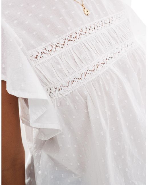 Vero Moda White High Neck Flutter Sleeved Embroidered Top