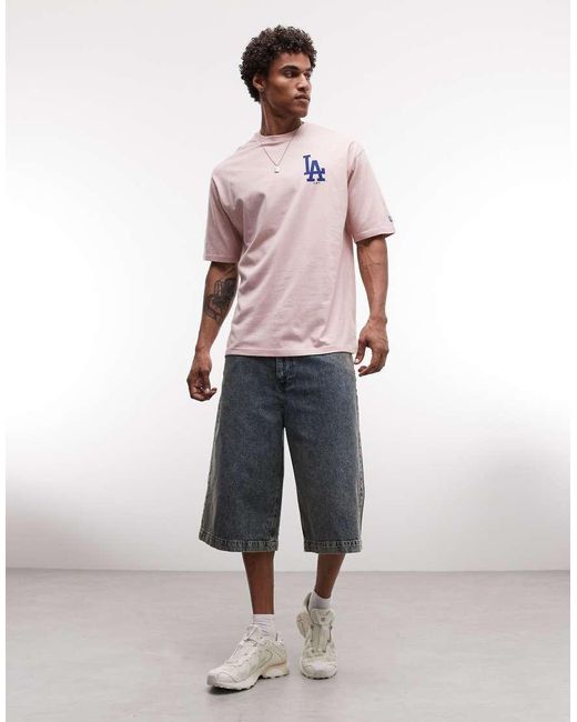 KTZ Pink La Dodgers Logo With Cap Back Graphic T-Shirt for men