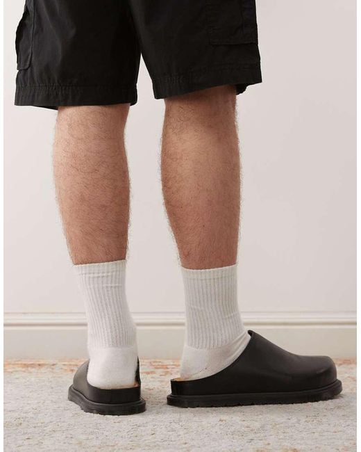 Dr. Martens Black San Mule