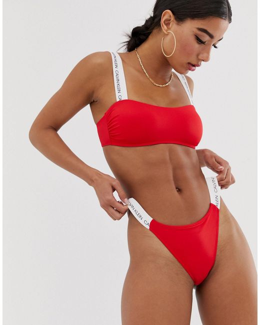 Calvin Klein Cheeky Logo Strap Bikini Bottom in Red | Lyst UK