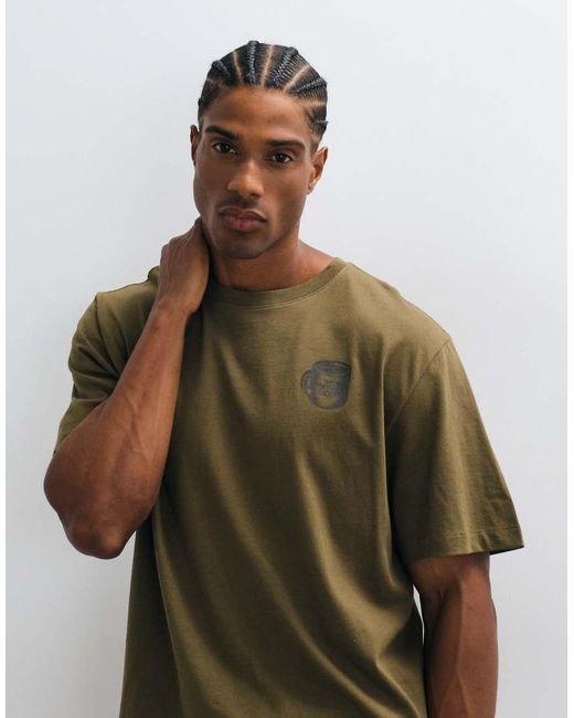 The North Face Green Basecamp Barista Graphic T-Shirt for men