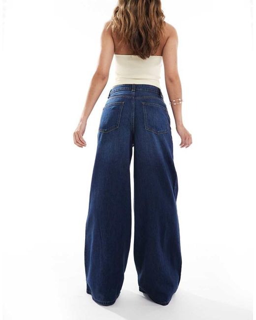 Jeans A Fondo Ampio Lavaggio Rinse Wash di ASOS in Blue