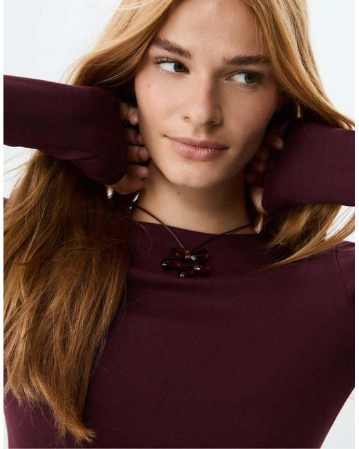 Maglietta Basic A Maniche Lunghe Color Melanzana di Stradivarius in Purple