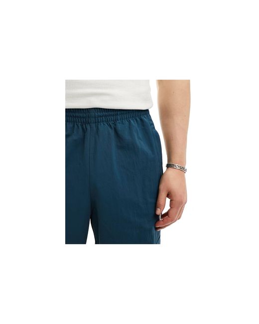 Adidas Originals Blue 3 Stripe Cargo Pants for men
