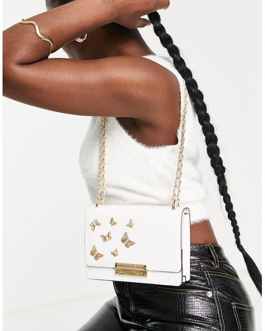 Butterfly aldo purse hotsell