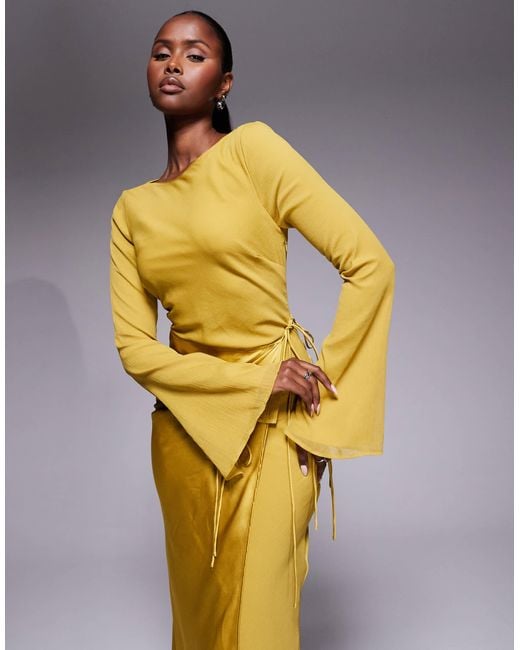 asos gold wrap dress ASOS DESIGN wrap halter maxi dress with back buckle detail in gold