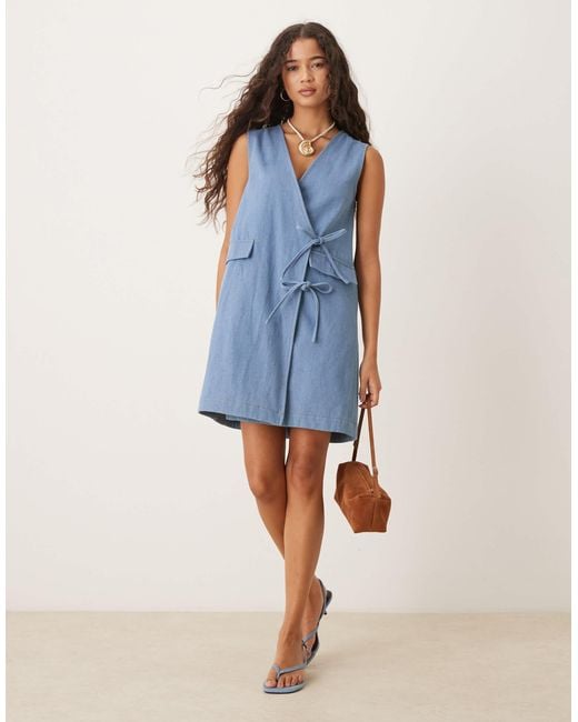 Beckett - robe portefeuille courte en denim Ghospell en coloris Blue