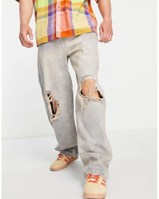 Collusion Denim X014 baggy Ripped Jeans With Pink Dirty Tint in Blue