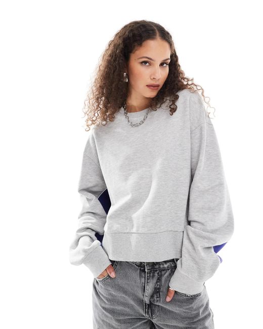 Collusion Blue – essential – sweatshirt mit bahnendesign