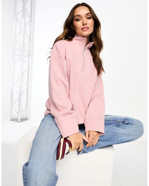 Maglione polvere oversize super morbido con zip corta di ASOS in Rosa