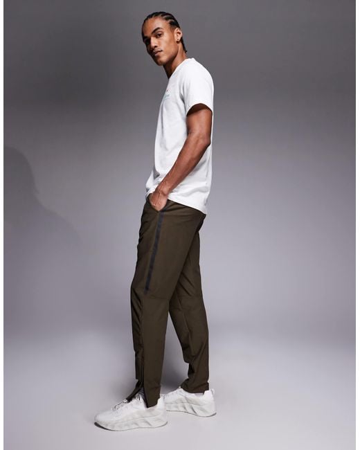 Nike Gray Solo Swoosh Cuffed Sweatpants for men