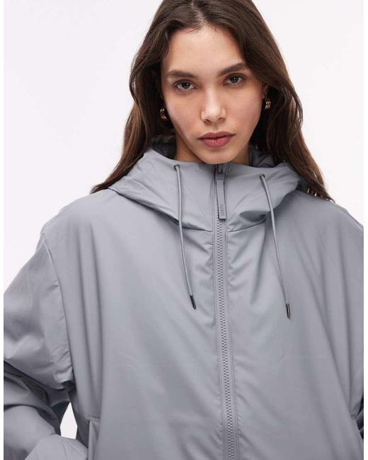 Chaqueta Corta Azul Claro Aislante Impermeable Con Capucha 15780 Lohja De Rains de color Gray