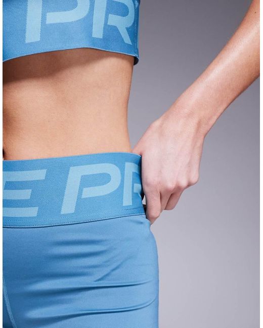 Leggings Cortos De 3" Azules De Talle Alto Sculpt De Nike Pro Training Nike de color Blue