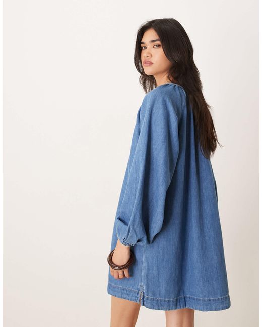 Robe courte en jean avec manches ballon - clair vintage ASOS en coloris Blue