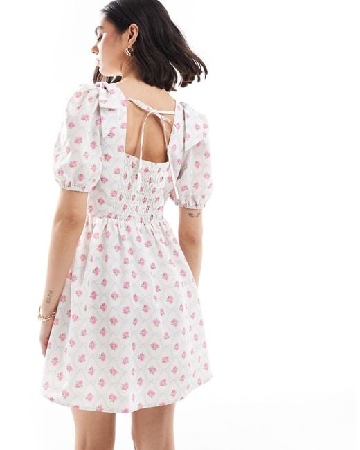 The Frolic White Exclusive Bow Shoulder Puff Sleeve Tie Back Mini Smock Dress
