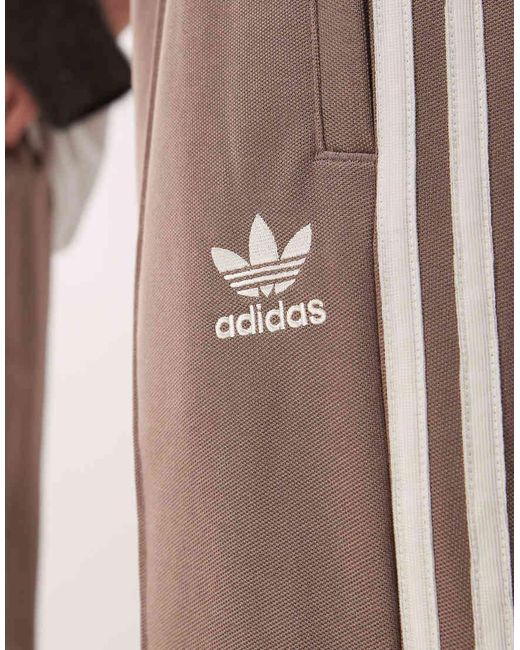 Pantalones De Chándal Marrones De Corte Suelto Firebird De -Marrón Adidas Originals de color Brown