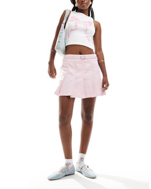 Mini-jupe plissée en jean ASOS en coloris Pink