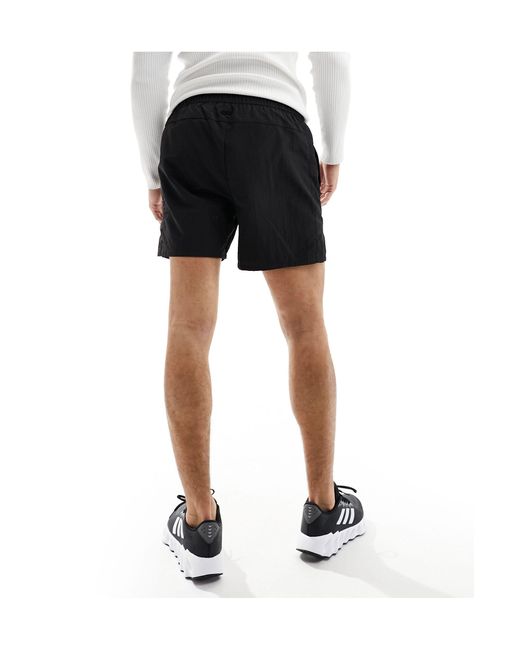 ASOS 4505 – sport-shorts aus nylon mit knitter-optik in Black für Herren