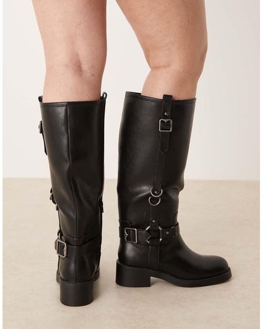 ASOS Black Curve Cobra Buckle Harness Knee Boots With Silver Hardware