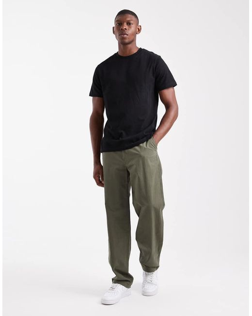 Camiseta Negra Básica Con Cuello Redondo De ASOS de hombre de color Blue