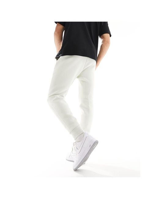 Joggers en hueso tech fleece Nike de hombre de color White