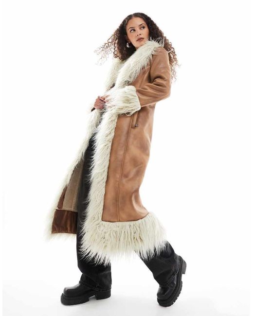 Urbancode Lange Jas Met Rand Van Imitatiebont in het White