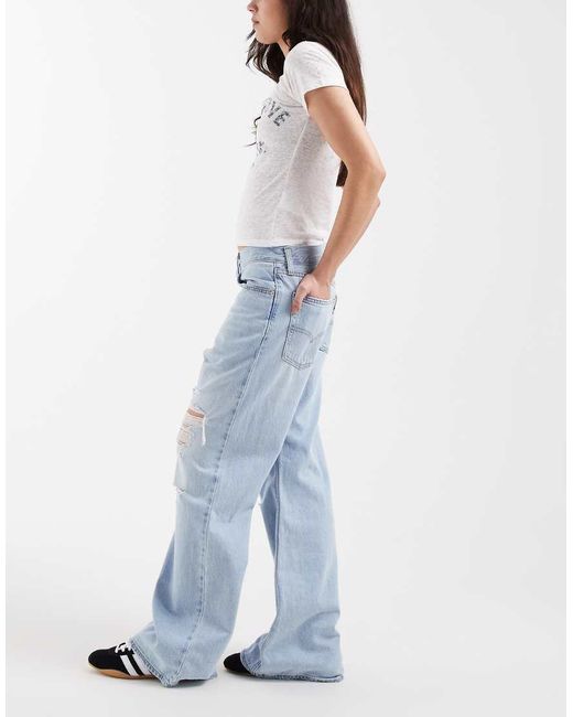 Levi's Blue Loose Bootcut Denim Jeans With Rips