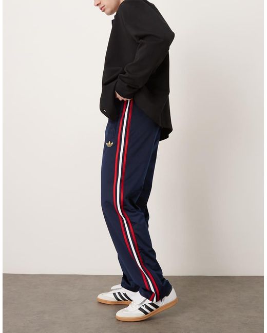 Adidas Originals Blue Firebird Track Pants for men