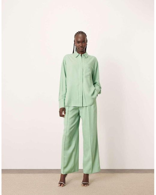 Pantalones Verde De Pernera Ancha Con Pespuntes En Contraste De (Parte De Un Conjunto) ARRANGE de color Green