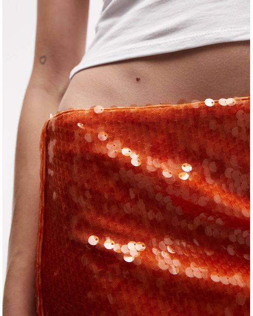 Mini-jupe à sequins Collusion en coloris Red