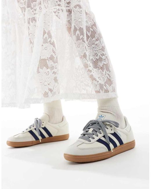 white adidas trainers women